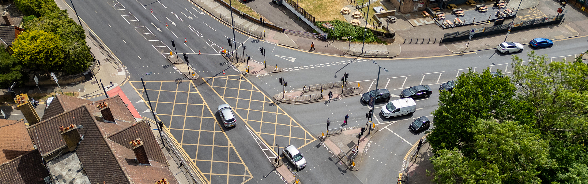 Aerial view of traffic moving through a monitored city junction