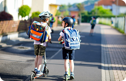 Children crossing a safer street outside their school