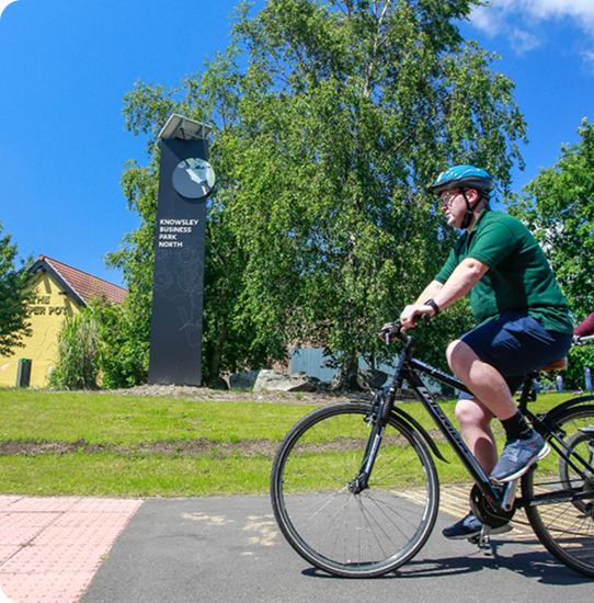 Cyclist riding through a city street